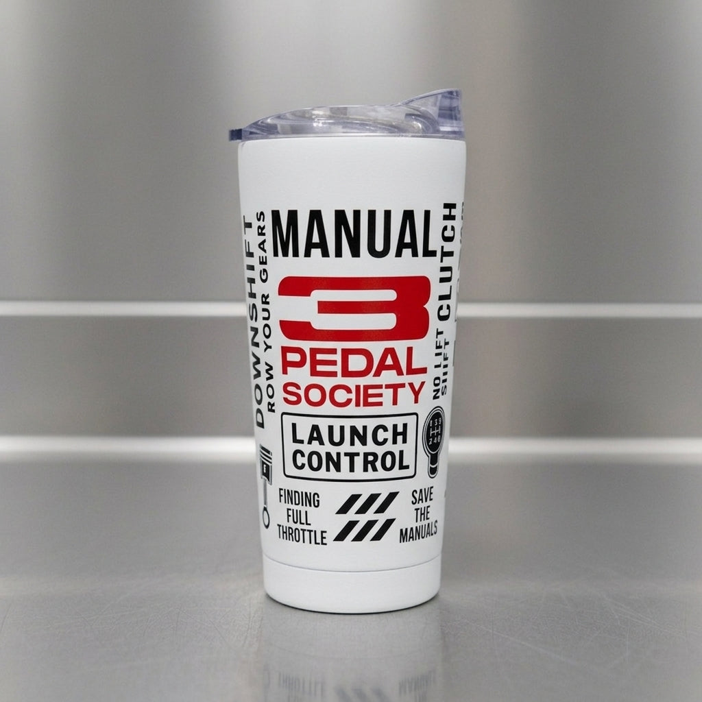 A white insulated tumbler with a clear lid, featuring a red and black '3 Pedal Society' logo and text on the front, set against a gray metallic background.