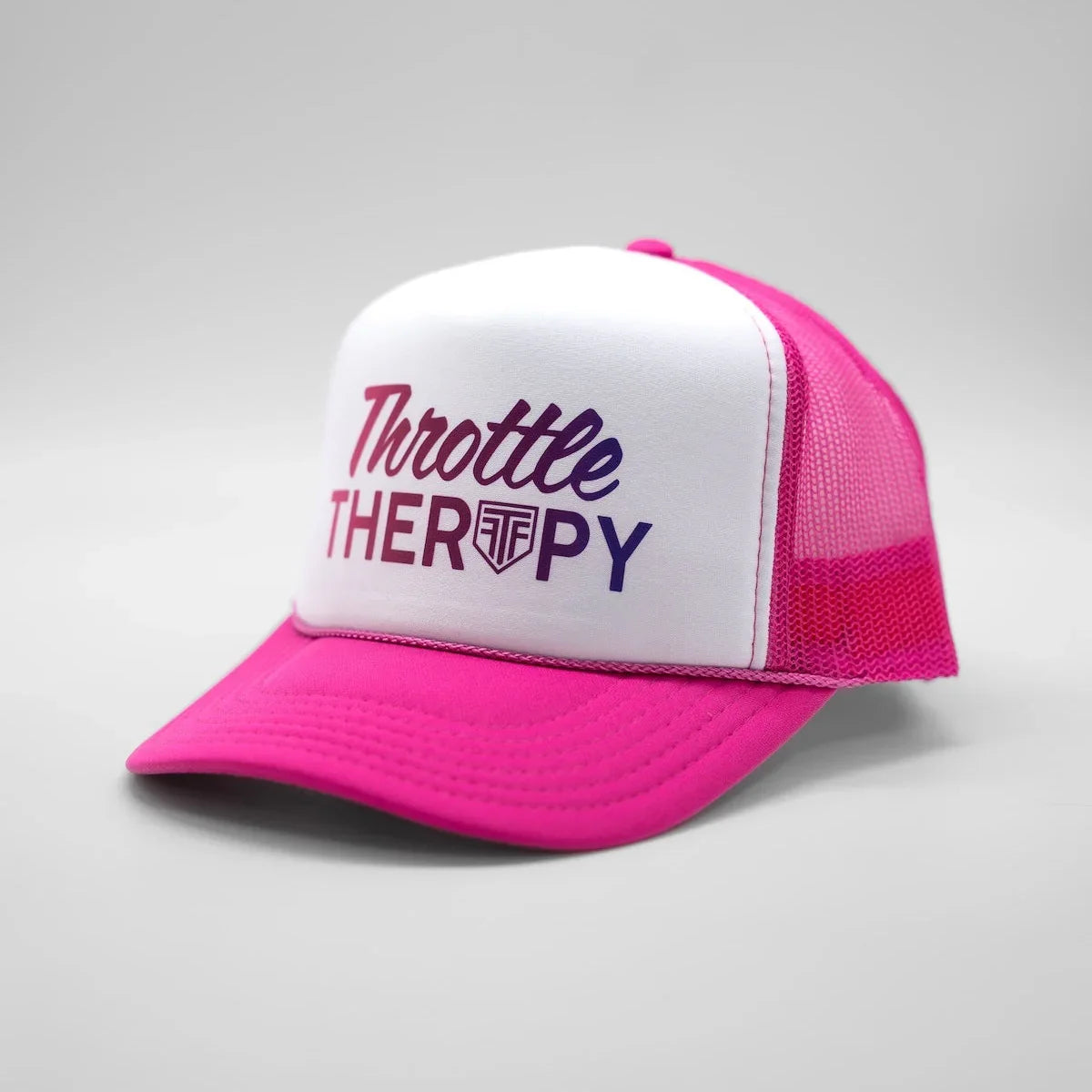 Pink and white cap with 'Throttle Therapy' text on a gray background