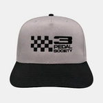 A two-tone snapback cap with a light gray crown and a black curved brim, featuring a black checkered flag and '3 PEDAL SOCIETY' logo embroidered on the front.